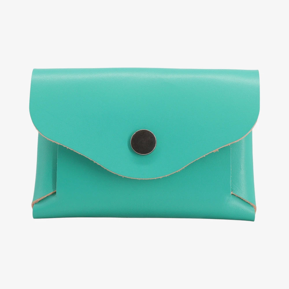 Turquoise leather coin purse with textured finish and snap button flap closure