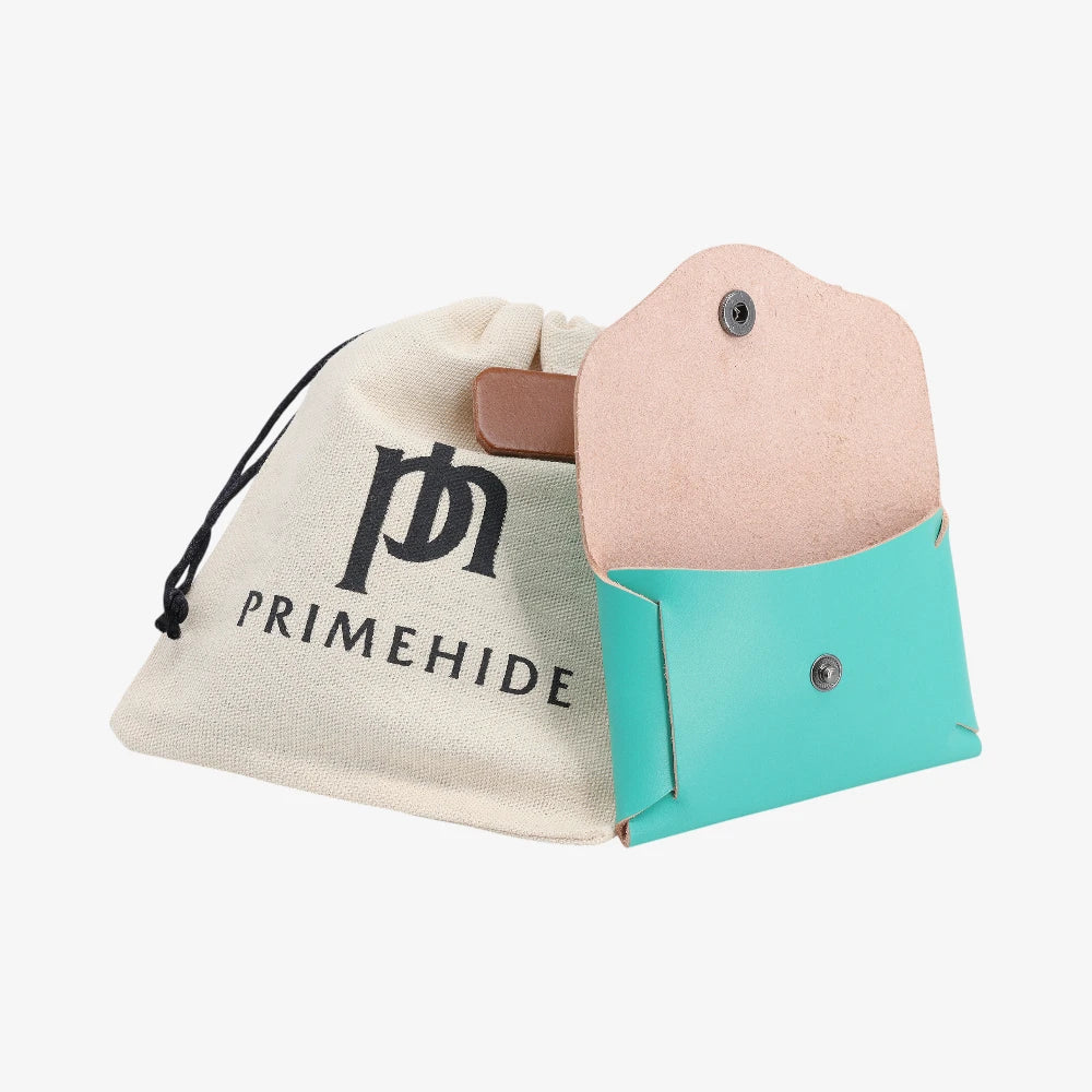 Turquoise leather coin purse open view with Primehide branded drawstring pouch