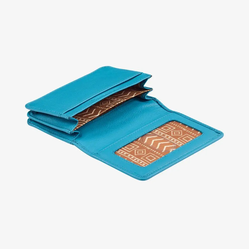 Turquoise wallet with geometric pattern on a white background