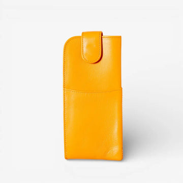 Yellow leather pouch on a light gray background