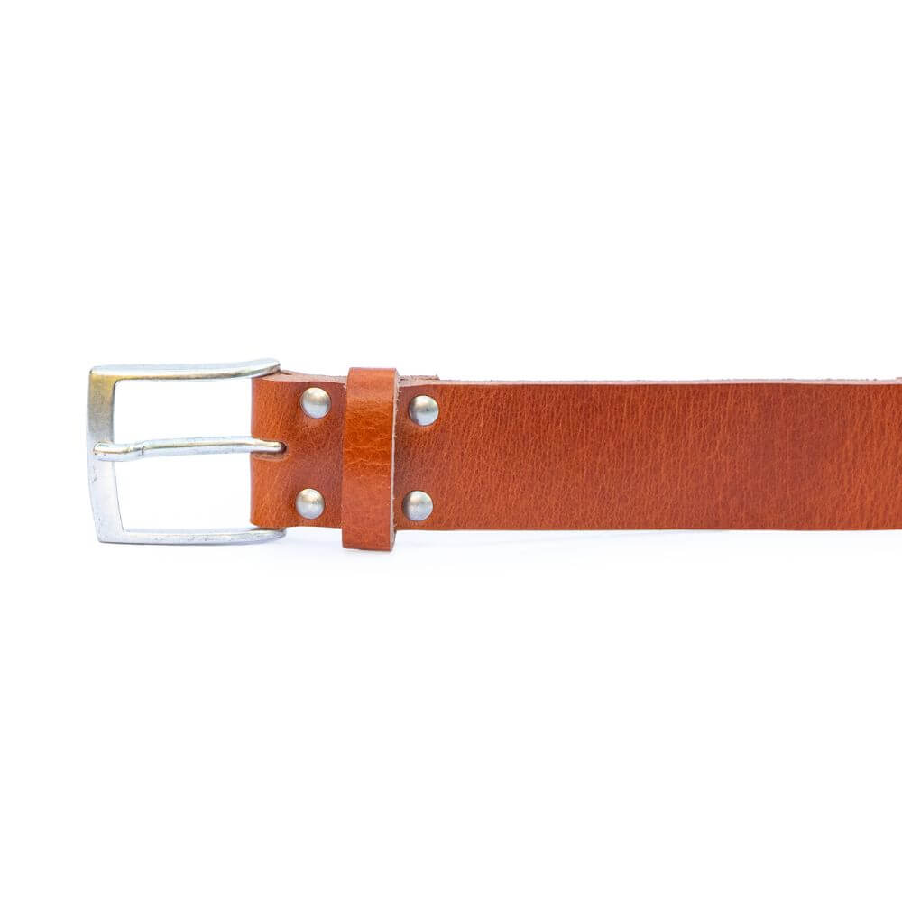 Brown leather belt with silver buckle on a white background