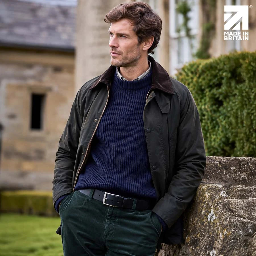 Men’s black 40mm full-grain Italian leather belt made in Britain worn with smart-casual trousers