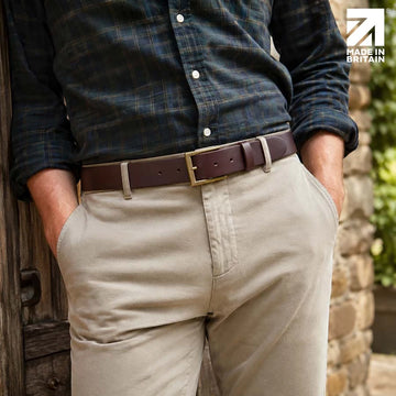 Men's brown 35mm full-grain Italian leather belt made in Britain, worn with chinos