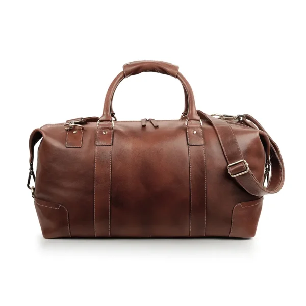 Side view of the brown leather holdall, featuring its durable zippers and side attachments for the shoulder strap.