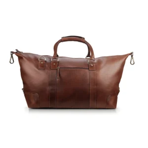 Rear view of the vintage leather holdall with a zippered pocket and polished hardware details.