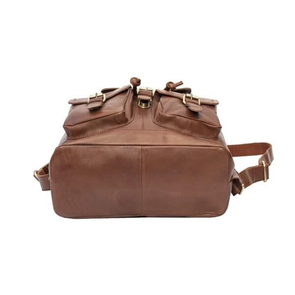 underside view of a brown leather backpack