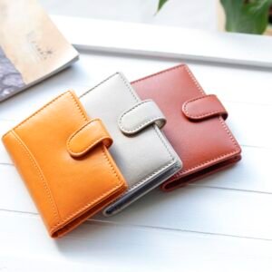 leather credit card wallets for women with detailed stitching and a tab closure