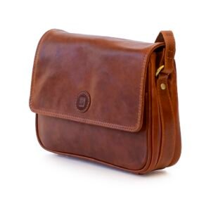 brown leather bag, closed up view to show detailed stitching and buttery soft leather.