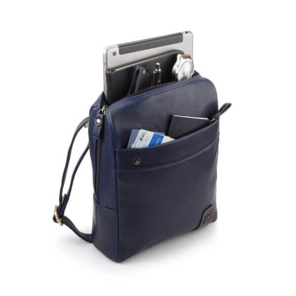 Side-angled view of navy real leather messenger bag with gold-tone hardware – smart and compact crossbody design for work or daily carry.